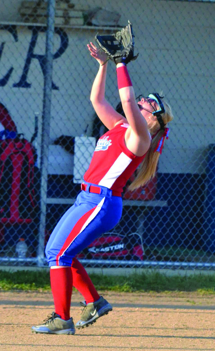 The bat and glove of senior Kaitlin Toller has been an integral part of the success of the 2016 Peebles Lady Indians. Photo by Mark Carpenter.