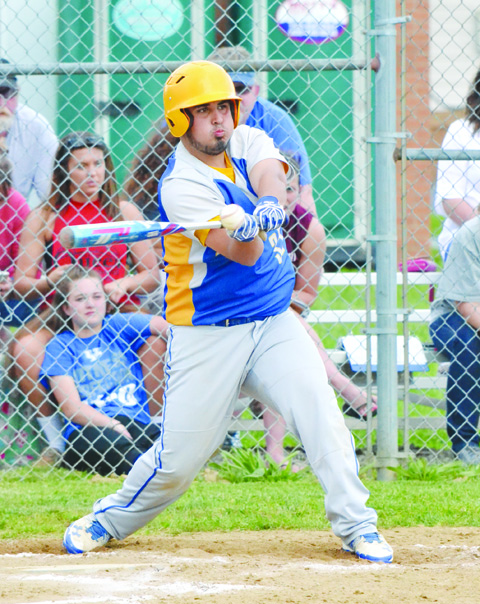 This swing by Manchester’s Mason Applegate produced the only run in the Hounds’1-0 win over Green in the Division IV sectional championship game. Photo by Mark Carpenter.