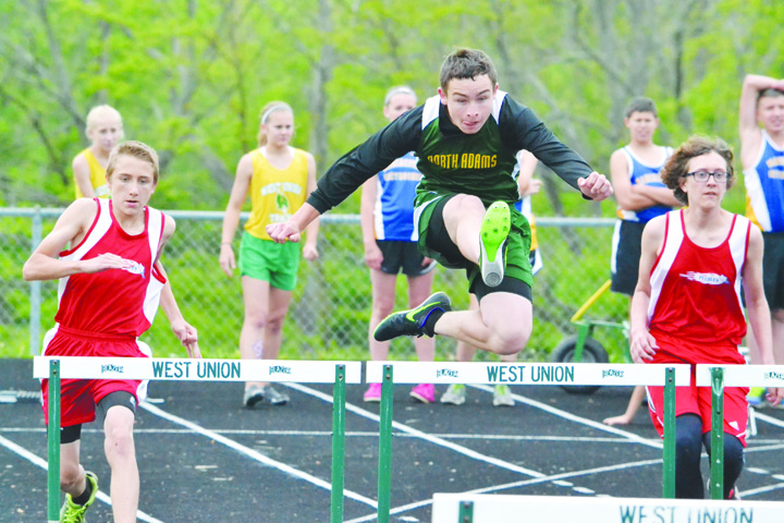 North Adams eighth grader Brandon Figgins easily clears this hurdle on his way to winning the 110 Meter Hurdles at this wek’s Junior High County Meet. Figgins won the event in a time of 18.95. Photo by Mark Carpenter