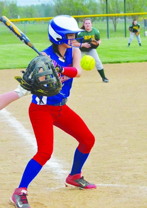 Peebles’ Sierra Stone watches this offering sail high during action from last week’s Lady Indians 9-2 win at North Adams. Photo by Mark Carpenter