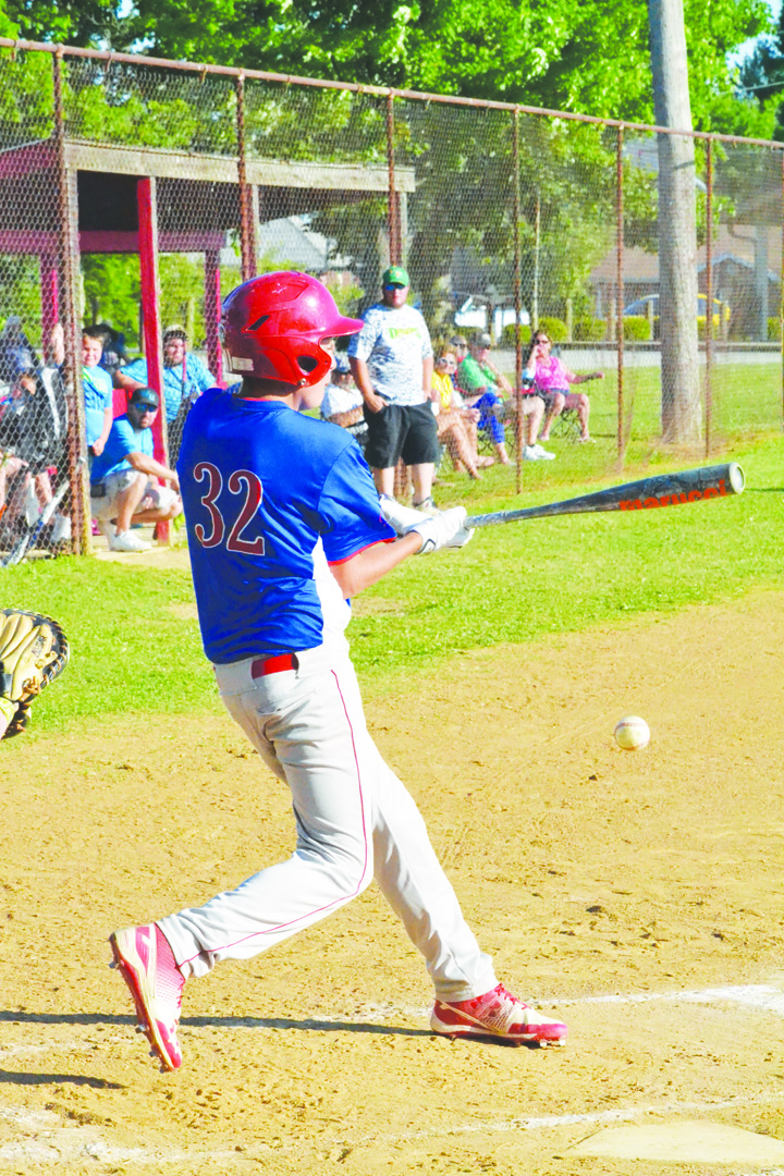 Peebles’ Lukas Rayburn makes contact with this swing in the first inning of Saturday night’s “A” baseball game. The contact resulted in a ground out to third base as Rayburn and the Indians dropped a 2-1 decision to West Union.