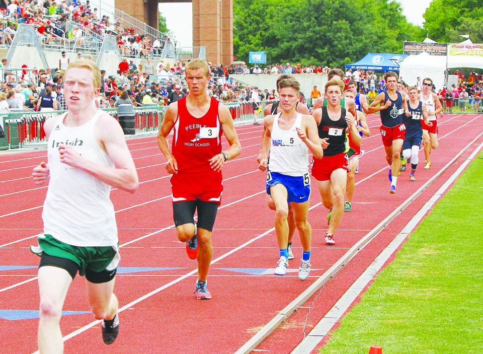 Peebles senior Daniel Seas, left (3), finished third in the final race of his high school career, which happened to be the OHSAA State Meet. Seas finished with a time of 9:25.97. Photo by ImpactActionPhotos.com
