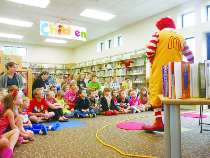 Ronald McDonald visits the North Adams Library.