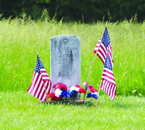 The grave site of soldier Zachariah Moon sits alone alone Highway 41.