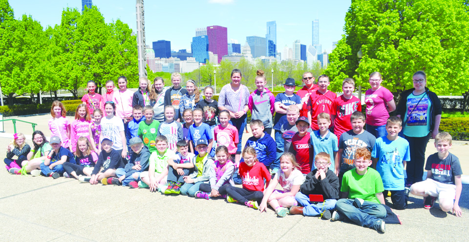 The students in the TAG program in the Adams County Ohio Valley Local School District recently made an end-of-the-year field trip to the city of Chicago. Here, the students are shown in front of the city’s skyline.