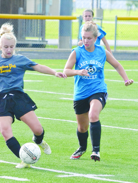 Jordyn Kell, battling for possession here against Georgetown, will be one of the top returning girls soccer players in the SHAC in 2016.