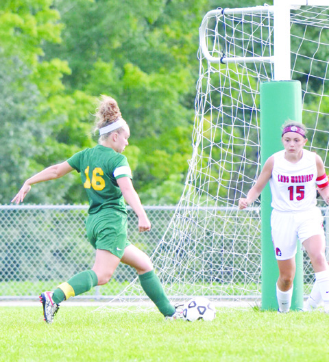 This shot by North Adams’ Jordyn Kell (16) resulted in the only goal of the half as the Lady Devils topped Eastern Brown 1-0 in the SHAC Soccer Preview.