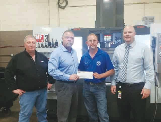 Pictured, from left,Greg Bailey, Doug Dodge, Roy Cooper, and Jason Vesey.