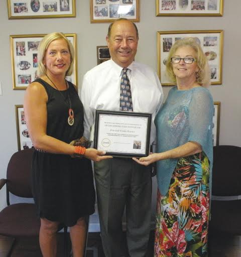Pictured with Adams County Agricultural Society President Liz Lafferty, left, are the 2016 Outstanding Fair Supporters, Don and Venita Bowles.