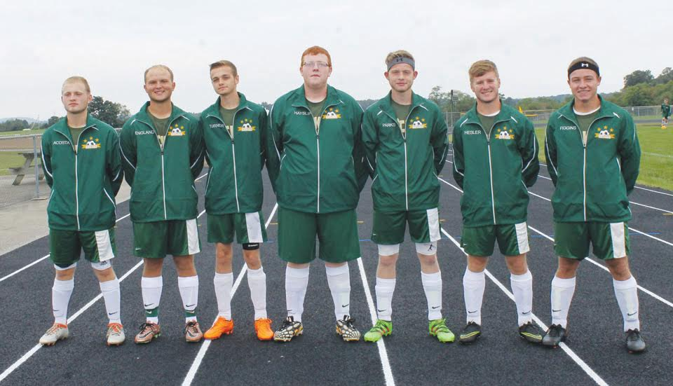 With their 1-0 loss to Bishop Rosecrans in the district tournament, the high school soccer careers came to a close for these seven North Adams seniors. From left, Zeke Acosta, Patrick England, Kain Turner, Randall Hayslip, Austin Parks, Lee Hesler, and Ben Figgins.