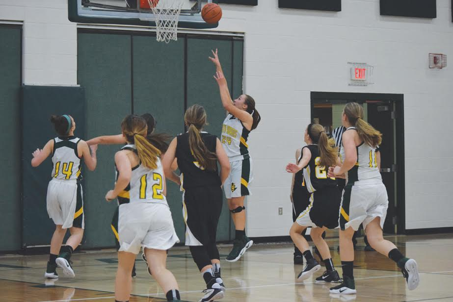 North Adams freshman Alaina Eiterman goes up for two of her game-high 16 points as the Lady Devils’ JV squad defeated Paint Valley 37-18 in their season opener on Nov. 29.
