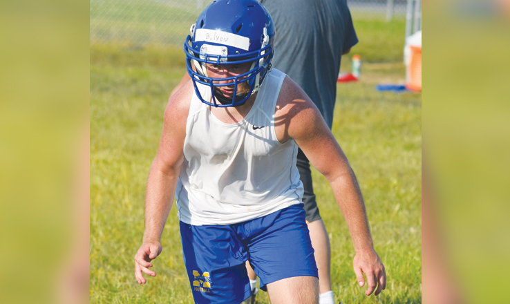 Senior-to-be Mason Bilyeu stalks his prey during a tackling drill at MHS football camp on Tuesday night.