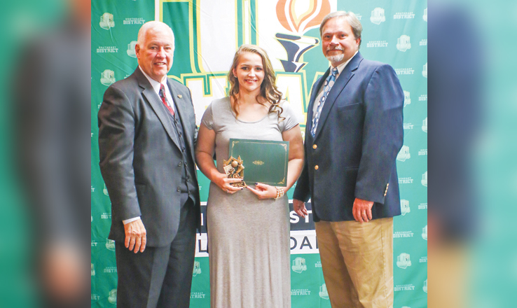 Caitlin Young, center, a 2017 graduate of North Adams High School was recently awarded one of the $500 Southeast District Athletic Board Scholarship. She is pictured here with OHSAA Commissioner Dr. Dan Ross, left, and SEDAB member Wayne Horsley, right.