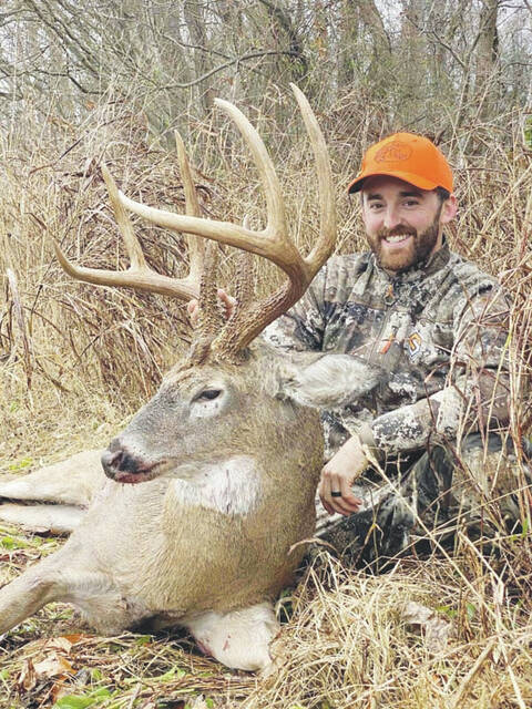NASCAR driver Austin Dillon from North Carolina, who drives for Richard Childress Racing with a nice 8-pointer he bagged during the week-long gun season here in Adams County. (Photo courtesy of Chad McCoy)