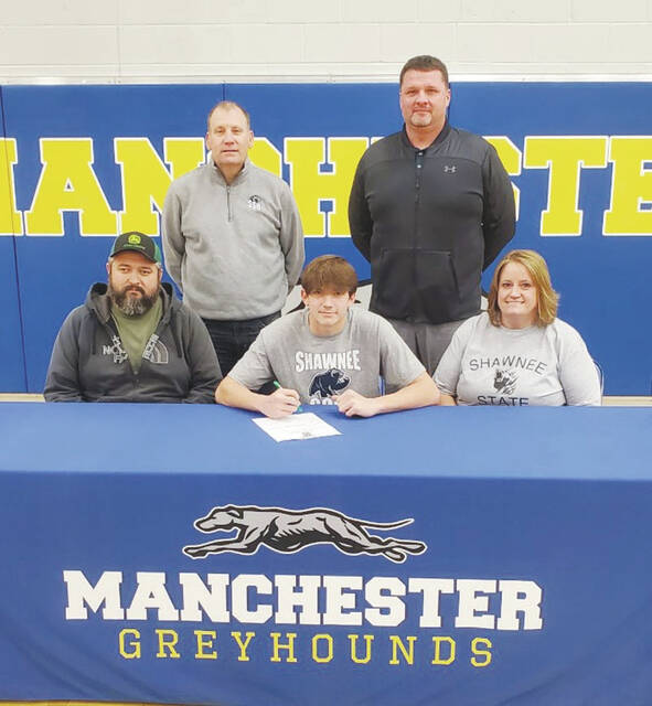 In a January 4 ceremony, Manchester senior Daulton McDonald signed his official letter of intent to continued his academic and athletic career at Shawnee State University. Pictured above: Front row, from left, David McDonald (father), Daulton McDonald, and Buffy McDonald (mother): Back row, from left, Dave Hopkins (Shawnee State Golf coach), and Adam Poole (MHS Golf Coach). (Photo by Mark Carpenter)