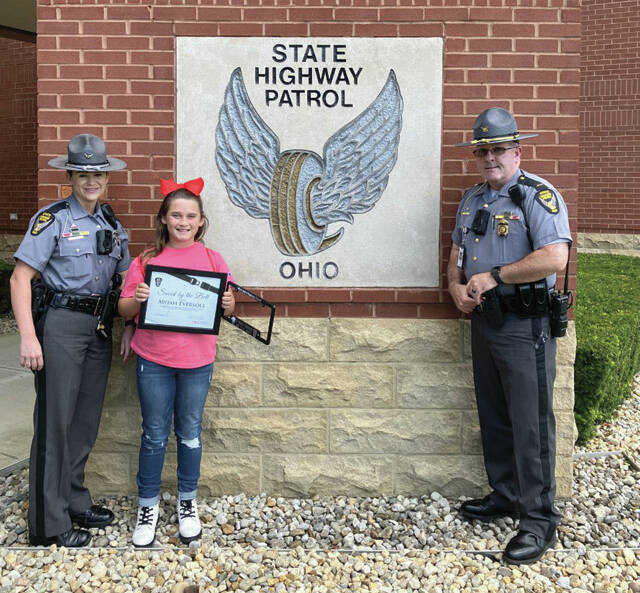 Trooper Sammie Wedmore, Myiah Eversole and Lieutenant Charles Jordan.