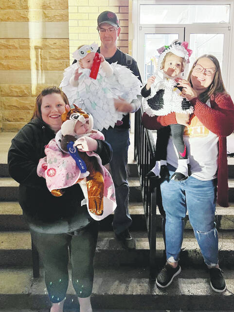 Infant to One-Year Costume Winners: 1st Place-Mackenzie Adams (Chipmunk); 2nd Place- Tomlynn Young (Owl); 3rd Place, Rhettlee Liddell (Cow). (Photo by Sherry Larson)