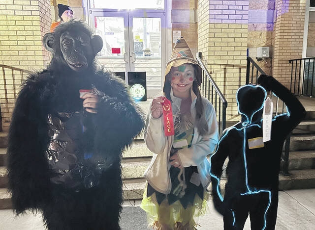 10 - 12 Year-Olds Costume Winners: 1st Place- Gabe Stewart (Gorilla); 2nd Place- Sophia Hill (Scarecrow); 3rd Place- Radley Mathews (Glowing Man) (Photo by Sherry Larson)