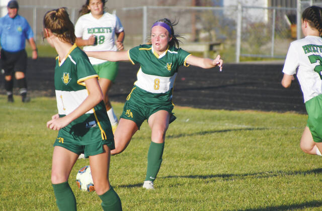 North Adams freshman Emmy Holt (8) clears traffic and controls the ball in action from the Lady Devils 3-0 win over Fayetteville on October 10. (Photo by Mark Carpenter)