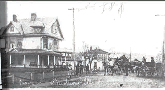 Pictured is a 1909 street seen in Dunkinsville with the beautiful T.C. Crawford home on the left. The doctors office which still stands today, can be seem just beyond the front porch. Used courtesy of the Dunkinsville United Methodist Church and Reverend Vic Potts.