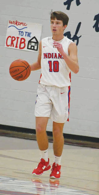 Peebles senior guard Mason Sims scored 13 points in the Indians heartbreaking 50-47 loss at Ripley on December 9. (Photo by Mark Carpenter)