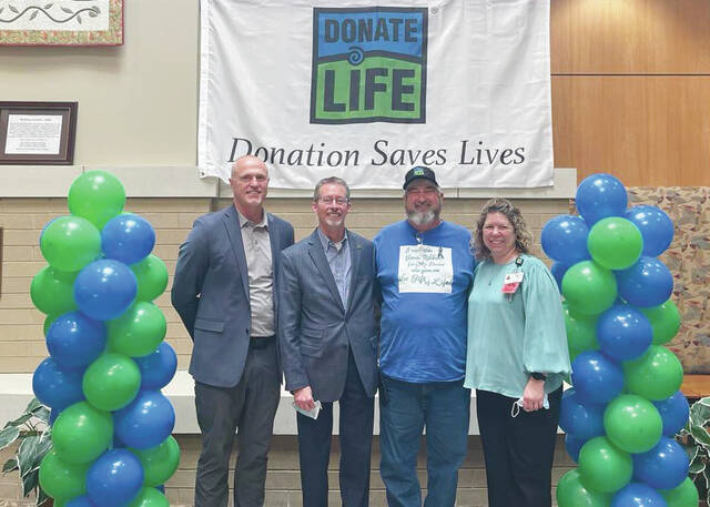 From left, Alan Bird, CEO of ACRMC; Barry Massa, Executive Director of Life Center Organ Donor Network; David Waits, heart transplant recipient and Rachel Cummings, CNO of ACRMC during the medical centers April organ donation and flag raising event. (Photo provided)