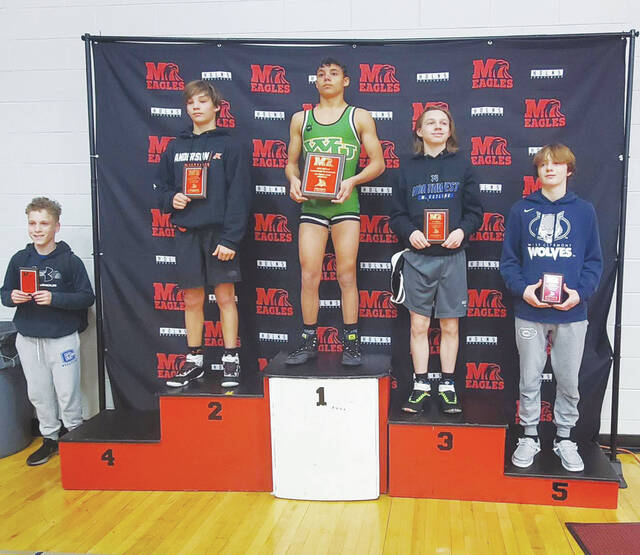West Unions Ethan Cantrell, center, placed first in his division at the recent Milford Invitational. (Photo courtesy of the Ohio Valley Wrestling Club)
