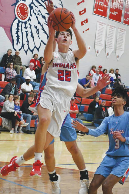 Peebles Gage Grooms goes up for an uncontested layup in action from the Indians sectional tournament loss to Portsmouth on Tuesday night. Grooms scored 8 points in the game. (Photo by Mark Carpenter)
