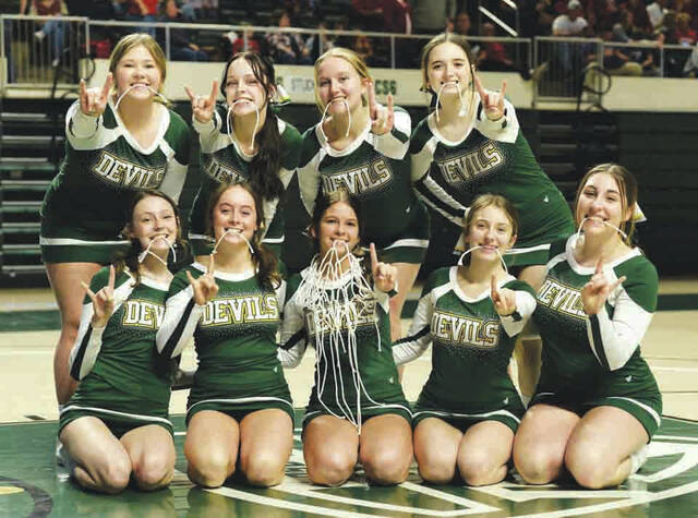 Even the North Adams cheerleading squad got in on the celebration act on Sunday, celebrating a Division III district championship. (Photo by Tim Daulton)