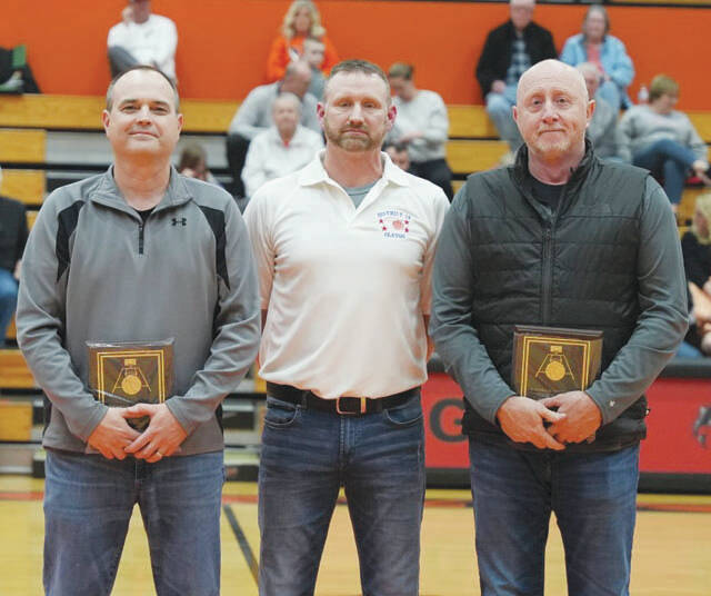 Southeast District Basketball Officials of the Year Rod Nichols and Keith Throckmorton with District 14 Basketball Director Josh Arey. (Photo provided)