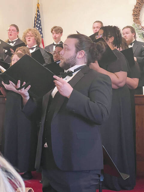 Concert Choirs tenor Samuel Smittle singing Ave Maria. (Photo by Sherry Larson)