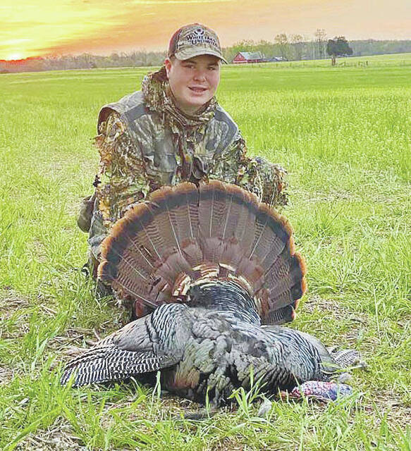 14-year old Carsyn Raines of Winchester with his 23 lb. gobbler taken during the youth season. The gobbler had an 11-1/2-inch beard. (Photo by Chad Raines)