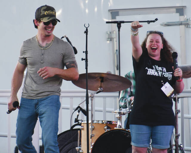 2022 American Idol winner Noah Thompson performed a duet with Adams Countys own Maria Sexton during his electrifying performance in the center ring on Tuesday night of the 2023 Adams County Fair. (Photo by Mark Carpenter)