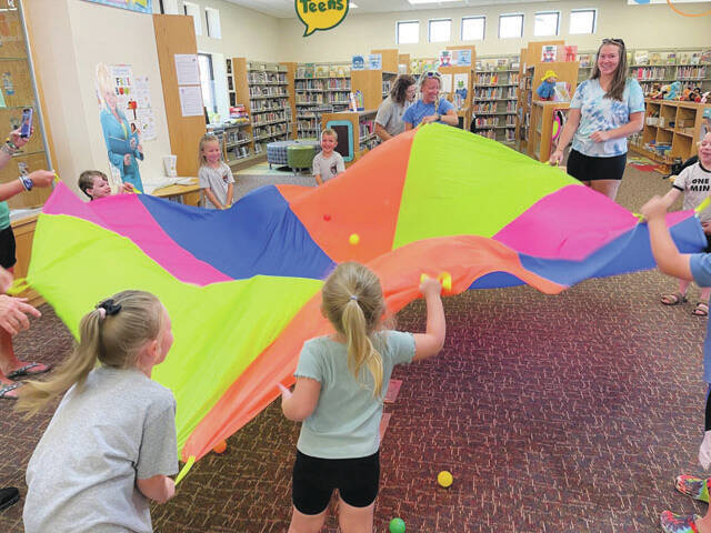 Families had a blast playing with the parachute at our Teamwork Storytime at the North Adams Library.
