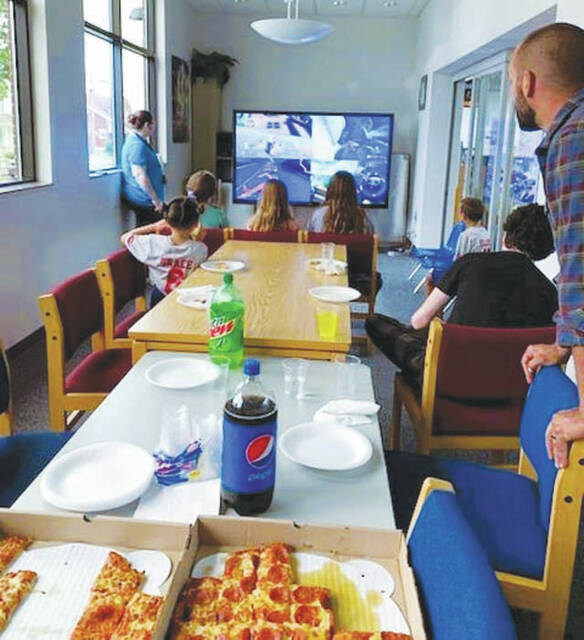 Children and families enjoyed eating Hometown Pizza and competing against one another at the Mario Kart Tournament at the Peeble Library on September 9.