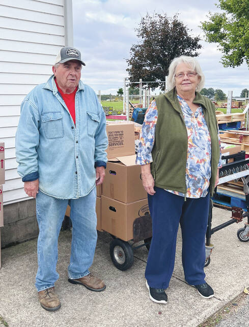 Ronnie Baldwin and Cathy Hall, volunteers at Liberty Chapel Scrubb Ridge UMC Food Pantry. (Photo by Sherry Larson)
