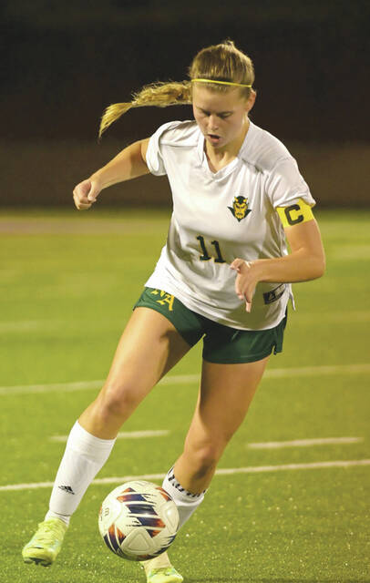 Senior Hunter Grooms advances the ball upfield during the Lady Devils 2-0 loss to Lynchburg in the Division III district championship game. (Photo by Tim Daulton)