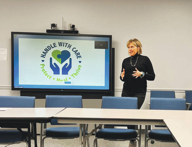 Retired school teacher and Co-Coordinator for Handle With Care Adams County, Susie McFarland trains trainers on the program. (Photo by Sherry Larson)