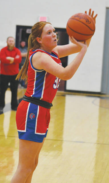 130204384_web1_Smalley
Peebles Abigail Smalley fires in 0ne of her four three-pointers in the Lady Indians win over Manchester. (Photo by Mark Carpenter)