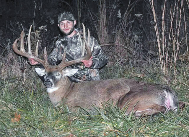 130261861_web1_C.-Alexander-with-buck-under-investigation
Wilmington resident Christopher J. Alexander posing with his allegedly poached state record buck taken on November 9, during the deer archery season in Clinton County.