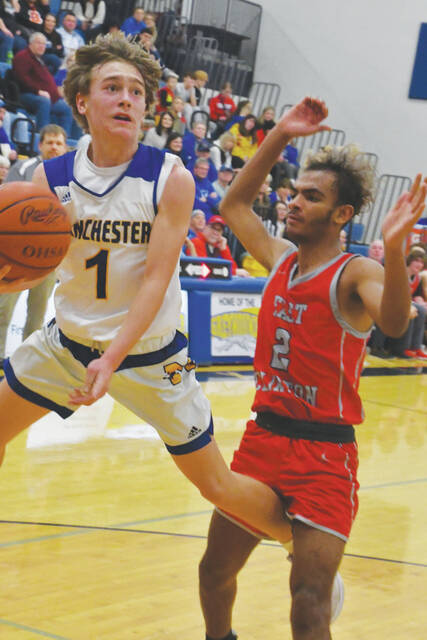 Sophomore guard Parker Hayslip (1) scored 13 points as he and the Manchester Greyhounds picked up a non-conference win over the East Clinton Astros on February 3. (Photo by Mark Carpenter)