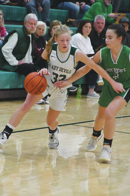 130351724_web1_KennediCampbell
North Adams seventh grader Kennedi Campbell (32) scored 12 points in the Lady Devils 34-14 SHAC Tournament championship win over Fayetteville on February 3. (Photo by Mark Carpenter)