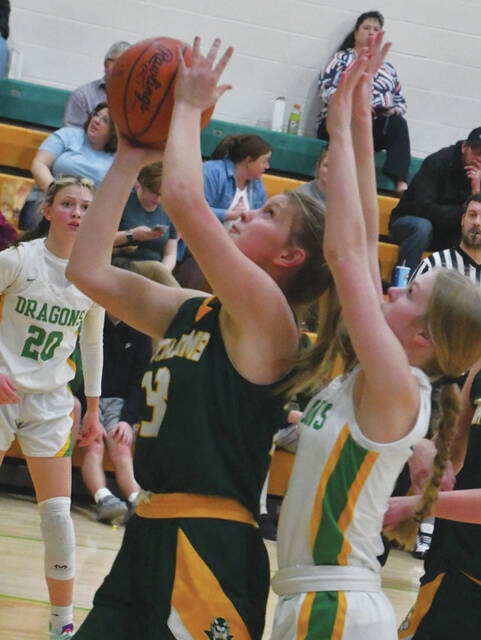 North Adams Taylor Shelton goes up for a shot in traffic as the Lady Devils downed West Union to clinch another Southern Hills Athletic Conference big school championship. (Photo by Mark Carpenter)