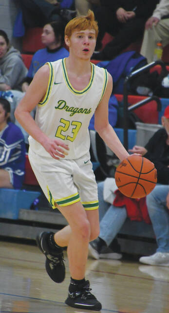 130401404_web1_GavinJarvis
In their final game of the season, a sectional tourney loss at Northwest, junior Gavin Jarvis led the West Union Dragons with 11 points. (Photo by Mark Carpenter)
