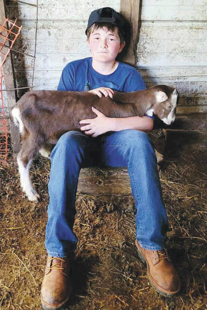 Parker Young with his LaMancha Dairy Wether. (Photo provided)