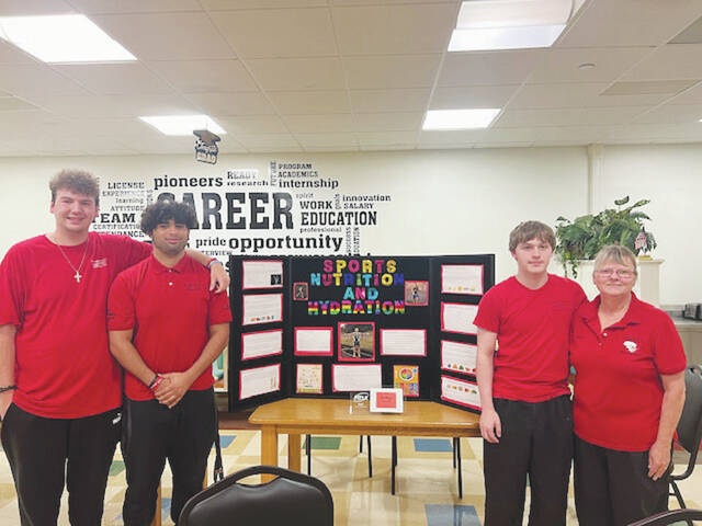 130606513_web1_Culinary
Headed to Nationals, from left, Dominick Raines, Devin Montgomery, Ezekiel Skaggs and Culinary Instructor Becky Foster. (Photo by Sherry Larson)
