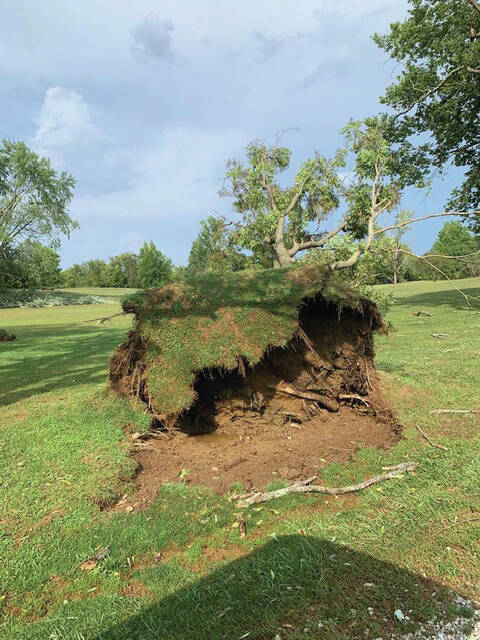 130846737_web1_Damage-1
The storms on Saturday caused damage at Hilltop Golf Course, such as this uprooted tree. (Photo courtesy of Paula McIntosh)
Downed trees and flooded streets were visible in the village of Manchester after last Saturdays storms passed through. (Photo courtesy of JoAnn Hilderbrand)