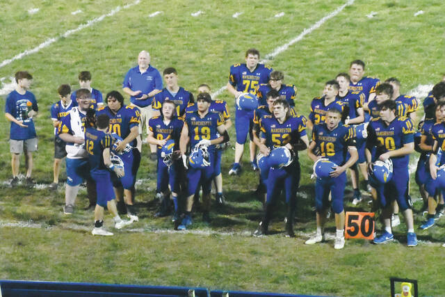 130871720_web1_MHSFB-Team
The Manchester Greyhounds currently stand 1-1 in their 2024 campaign, with home games coming the next two Friday nights. (Photo by Mark Carpenter)