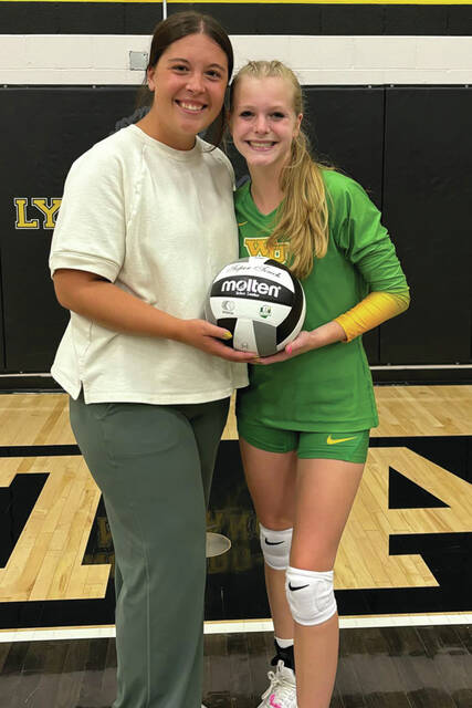 130930055_web1_Staten1000
After getting her 500th career dig earlier in the season, West Union senior setter Ashlah Staten picked up her 1,000th career assist in a September 13 match at Lynchburg. Staten is pictured here with WUHS volleyball coach Kiersten Rowe. (Photo provided)