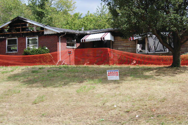 130966923_web1_Arson
A vacant residence in Manchester is currently fenced off by Investigators with the Ohio Department of Commerce Division of State Fire Marshal pending the outcome of an investigation into arson. (Photo Courtesy of State Fire Marshal)